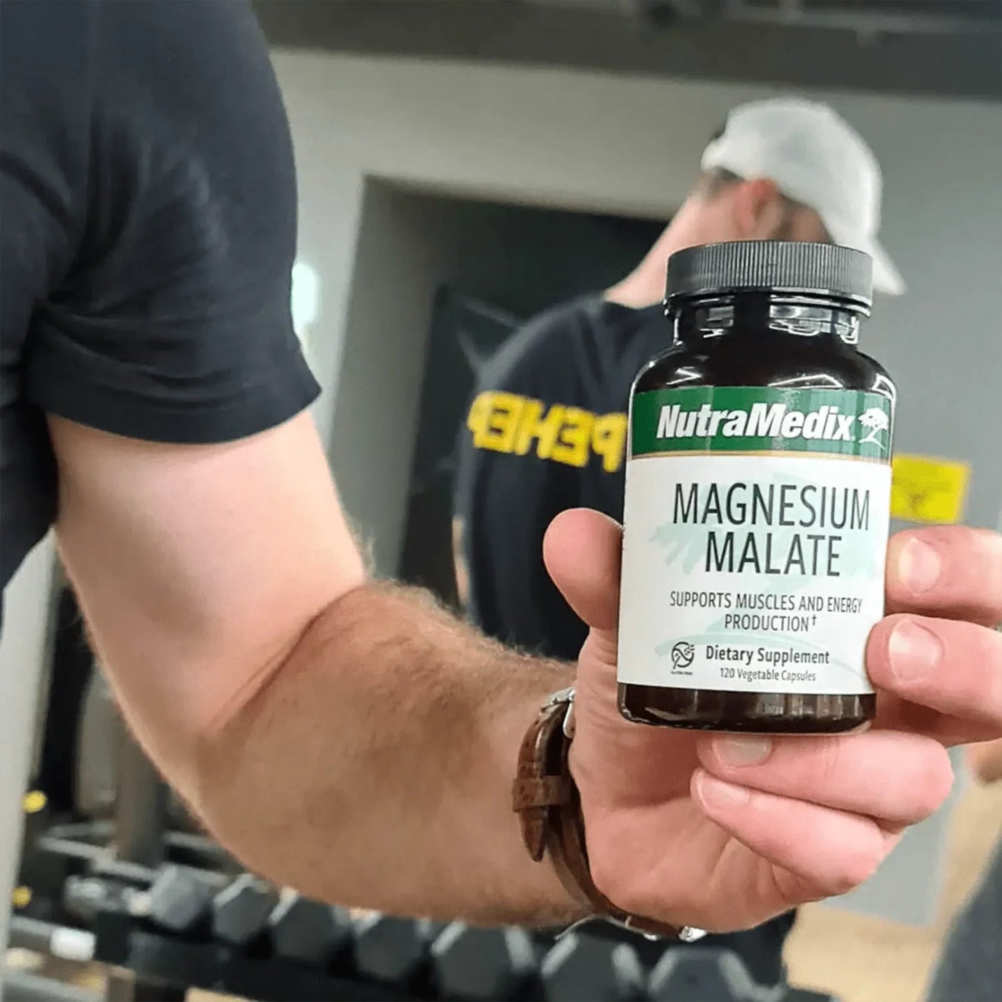 Magnesium Malate - 120 Vegetable Capsules for energy support used by a man at the gym