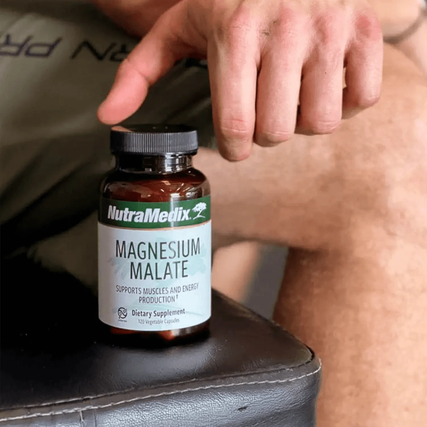 Magnesium Malate - 120 Vegetable Capsules  for energy support used by a man at the gym